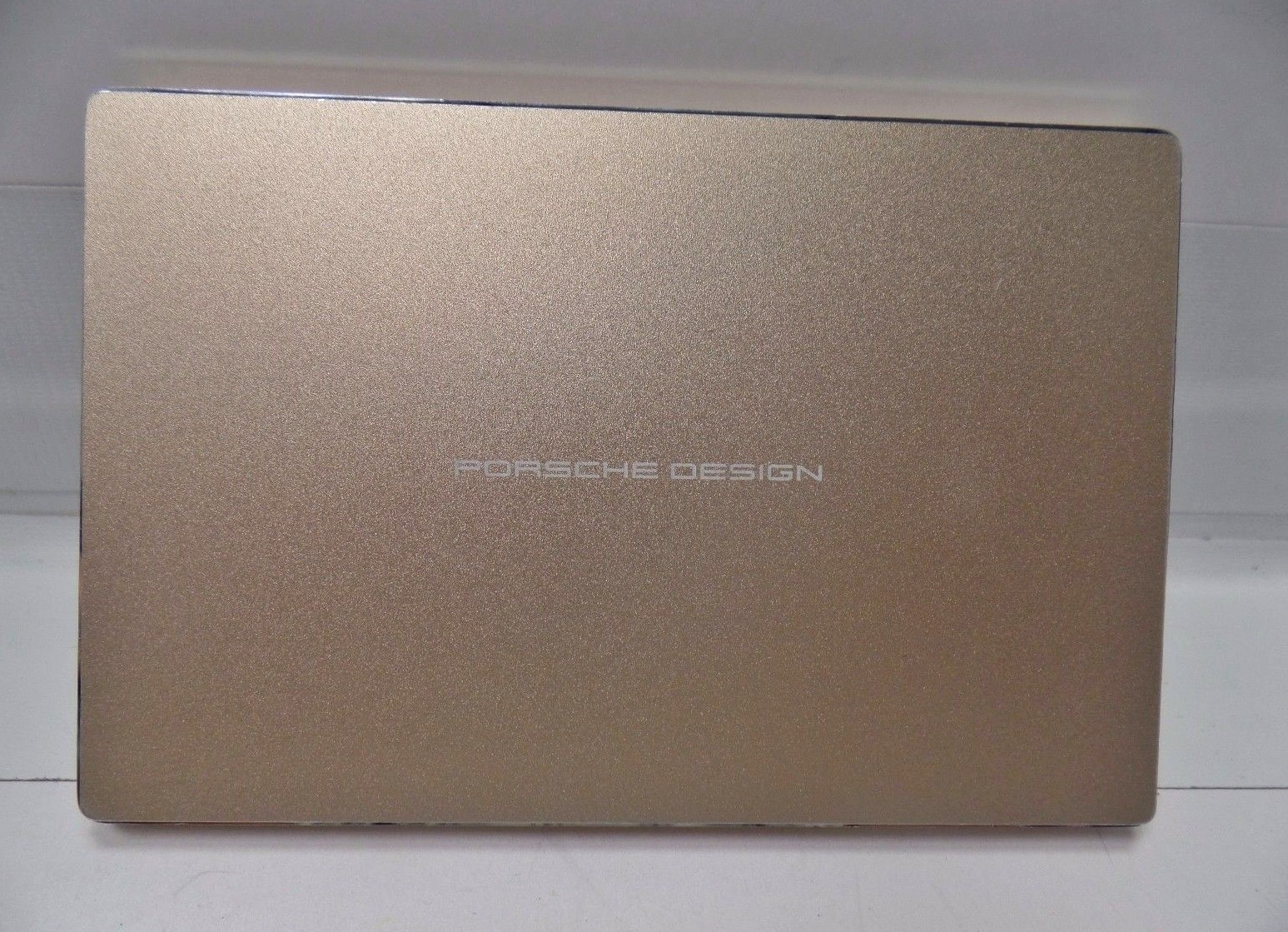 For sale LaCie Porshe GOLD Aluminum 2TB USB 3.0 Type-C Portable Hard Drive.MINT!