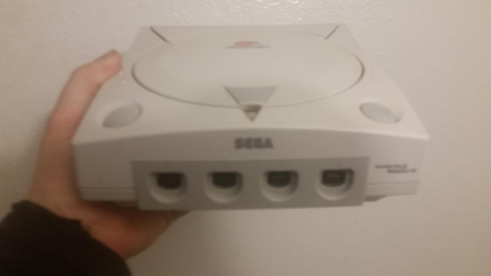 For sale Sega Dreamcast w/ Network adapter (plays burnt/backups) complete w/ 2 games