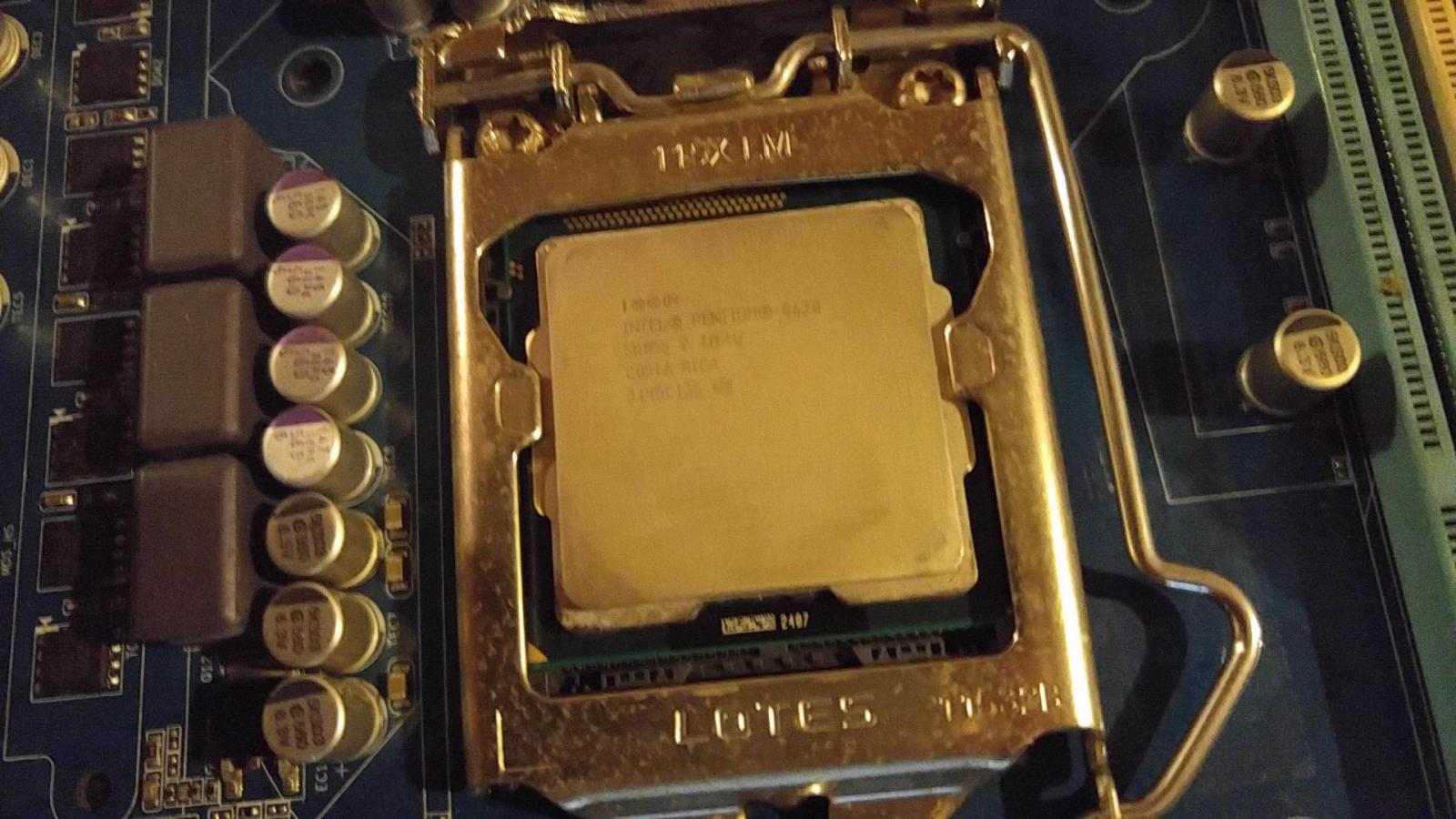 For sale Z68 mobo with CPU and Fan