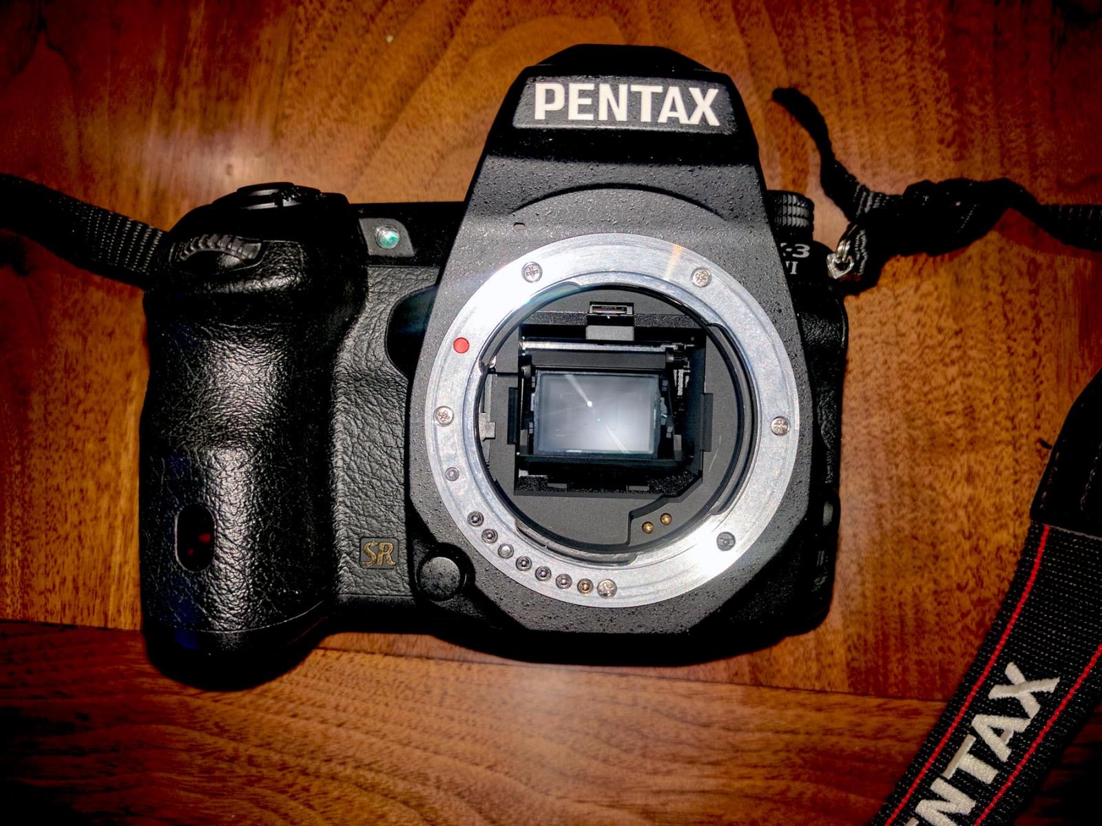 For sale Pentax K3ii w/ 50mm 1.8 lens, SD Cards, Portable Studio, And Reflector Set